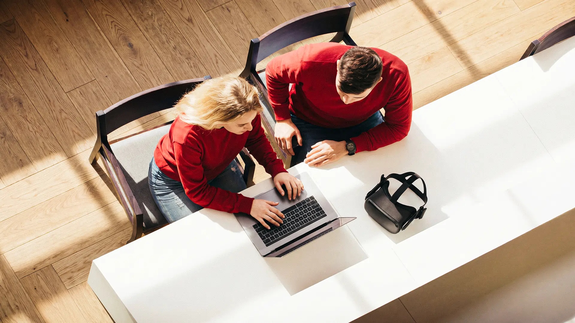 Kids studying and having fun in a university table.